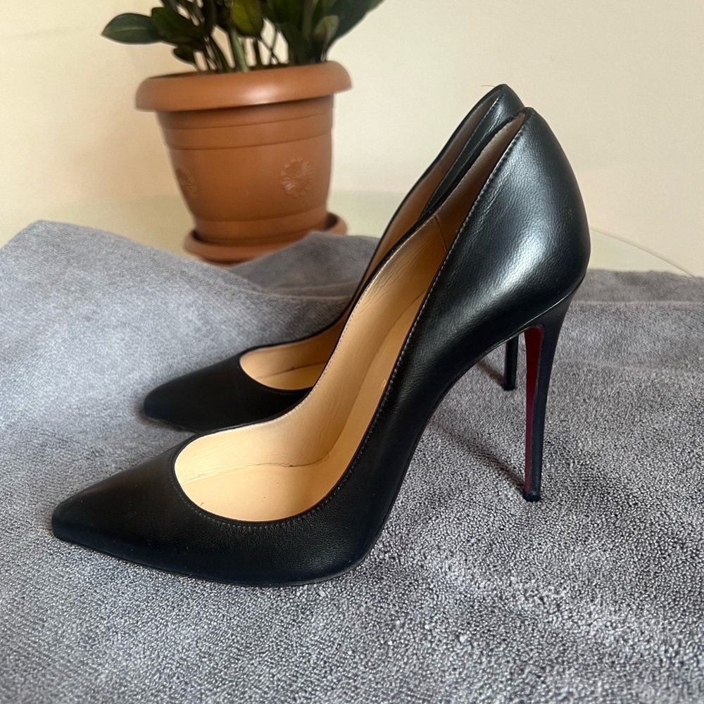 Christian Louboutin black leather pumps